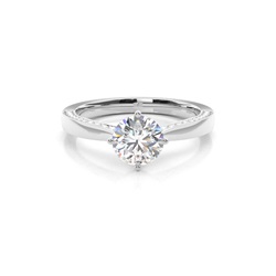 4 Prong Setting Round Diamond Side Stone Engagement Ring