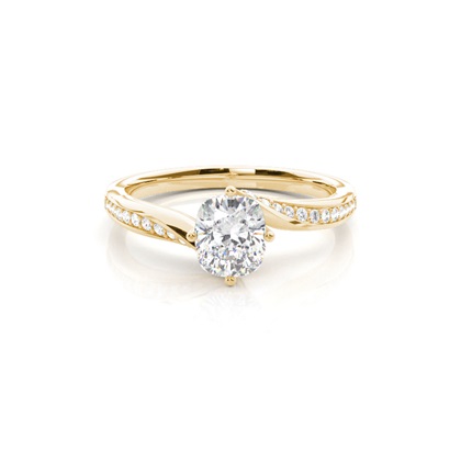 4 Prong Setting Round Diamond Side Stone Engagement Ring