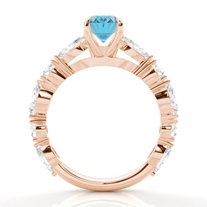 Verlobungsring mit blauem Topas in Krappenfassung