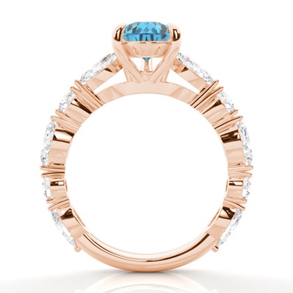 Verlobungsring mit blauem Topas in Krappenfassung