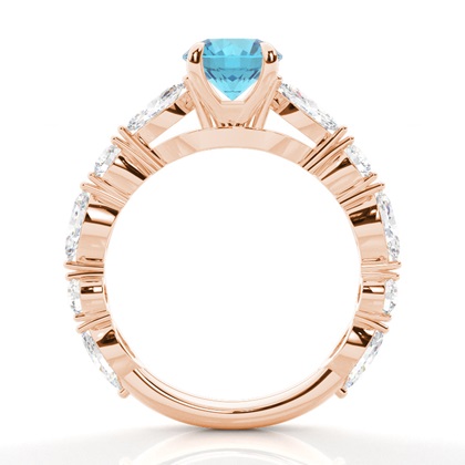 Verlobungsring mit blauem Topas in Krappenfassung