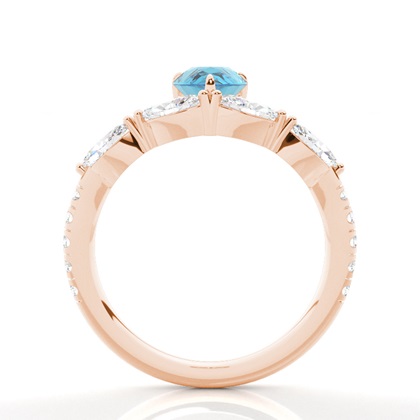 Verlobungsring mit blauem Topas in Krappenfassung