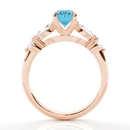 Verlobungsring mit blauem Topas in Krappenfassung
