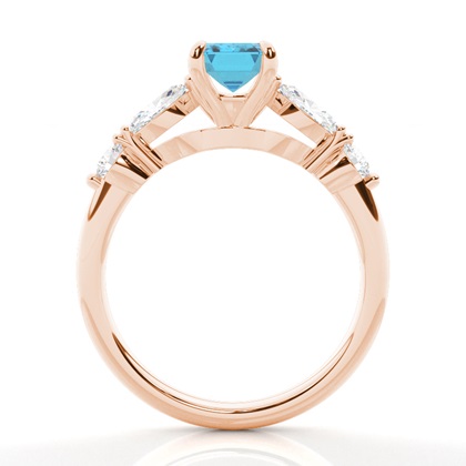 Verlobungsring mit blauem Topas in Krappenfassung