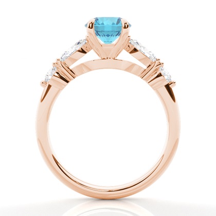 Verlobungsring mit blauem Topas in Krappenfassung