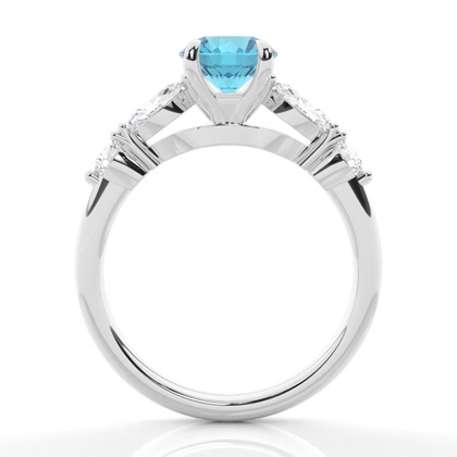 Verlobungsring mit blauem Topas in Krappenfassung