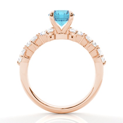 Verlobungsring mit blauem Topas in Krappenfassung
