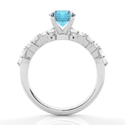 Verlobungsring mit blauem Topas in Krappenfassung