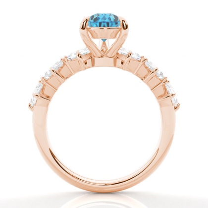 Verlobungsring mit blauem Topas in Krappenfassung