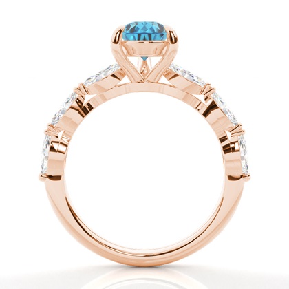 Verlobungsring mit blauem Topas in Krappenfassung