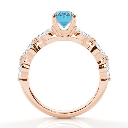 Verlobungsring mit blauem Topas in Krappenfassung