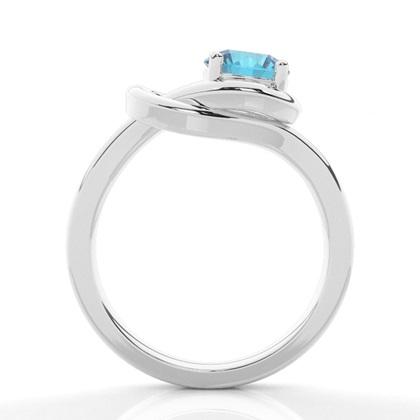 Verlobungsring mit blauem Topas in Krappenfassung