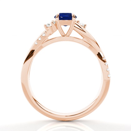 Runder Trilogie-Ring mit blauem Saphir in Krappenfassung