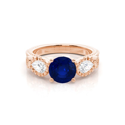 Prong Setting Round Blue Sapphire Trilogy Ring