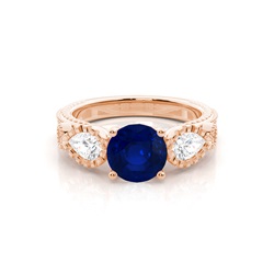 Prong Setting Round Blue Sapphire Trilogy Ring