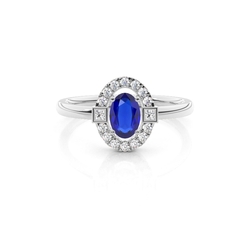 Alltagsring mit Princess- und Runddiamanten & ovalem blauen Saphir