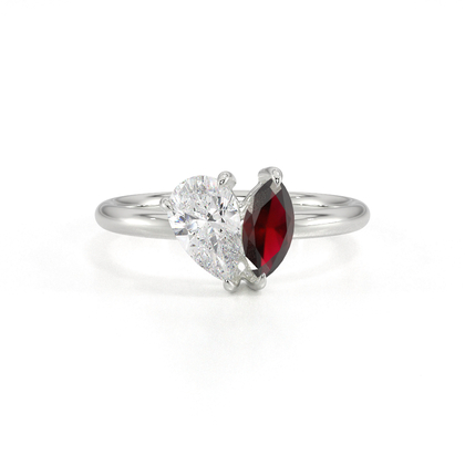 Toi-Et-Moi-Ring Mit Birnengeschliffenem Diamanten Und Marquiseschliff Rubin
