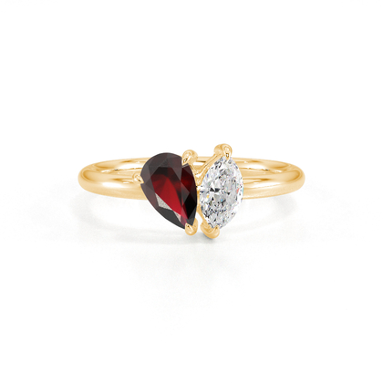Toi-Et-Moi-Ring Mit Birnengeschliffenem Rubin Und Marquiseschliff Diamanten
