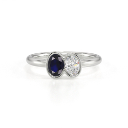 Toi Et Moi Lünettenfassung Ring mit ovalem blauem Saphir und Diamanten